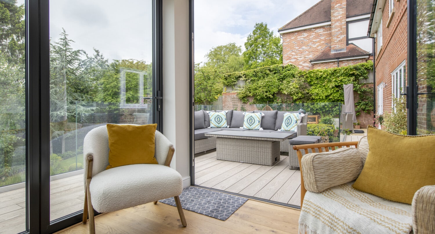 Open plan living room with aluminium doors